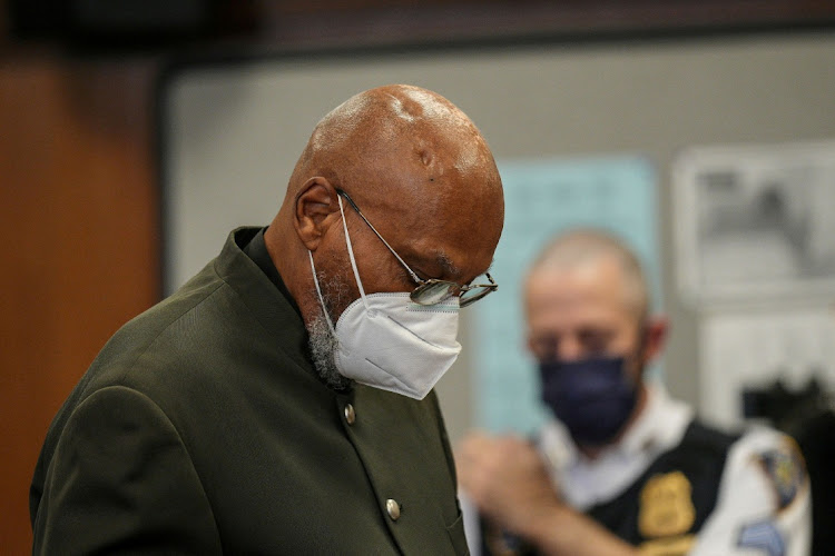 Muhammad Aziz, 83, one of the two men who spent decades in prison for murdering Black activist and civil rights advocate Malcolm X in 1965, looks down during his exoneration trial by a New York state judge at State Supreme Court in New York City, U.S., November 18, 2021.