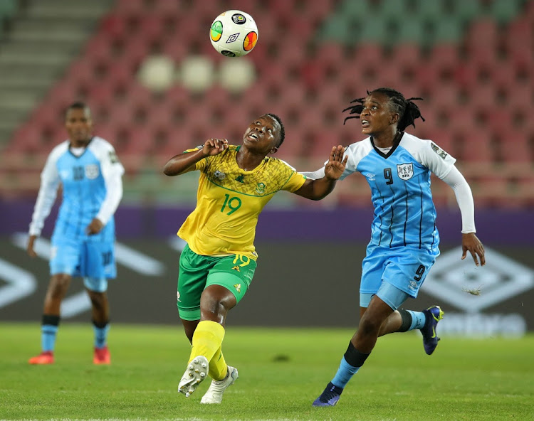 SA's Thembi Kgatlana is challenged by Refilwe Tholakele of Botswana in their 2022 Women's Africa Cup of Nations Group C match at Stade Prince Moulay Abdellah in Rabat, Morocco on July 10 2022.