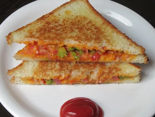 Cheese Schezwan Veg Grilled Sandwich