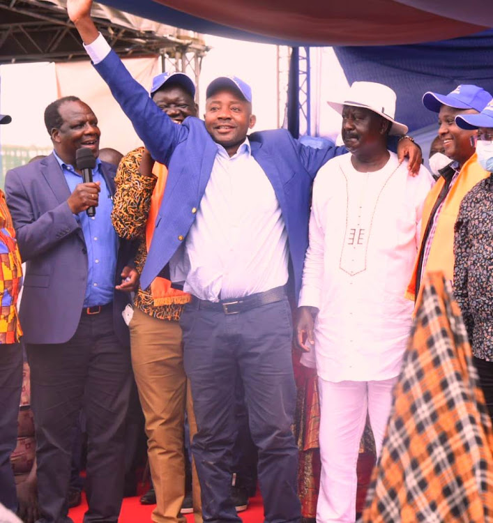 Lugari MP Ayub Savula waves to the crowds at Bukhungu Stadium after being ushered to azimio la umoja at Bukhungu Stadium.