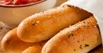 Buttery Garlic Breadsticks was pinched from <a href="http://12tomatoes.com/garlic-butter-puffy-breadsticks/" target="_blank">12tomatoes.com.</a>