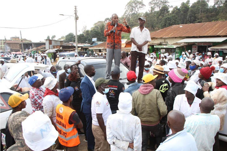 Kiambu Senator Kimani Wamatangi speaks to residents of Kamandura on March 10