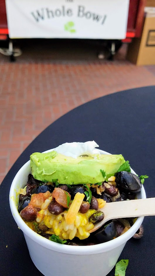 Pioneer Courthouse Square, Carts on the Square food cart pod, Whole Bowl cart. If you are looking for a healthy option especially if you are vegetarian or vegan, this is a great cart to make your go-to. It's extremely popular and successful- this downtown location is one of eight around the city. The bowl starts with a base of brown rice and black and red beans and includes toppings you can customize including salsa, avocado, sour cream, Tillamook cheddar, black olives, cilantro, and their signature Tali sauce.