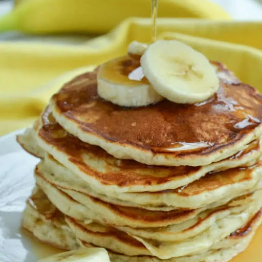 Get your banana fix with these family-friendly Banana Pancakes made with buttermilk, fresh bananas, vanilla, and a touch of cinnamon.  Make a batch today and impress your family.