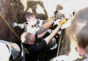 A team of emergency workers battled for four hours to rescue a baby who had been dumped in a stormwater drain. On Monday another newborn was found dumped in a hazardous medical waste bin at a state hospital.