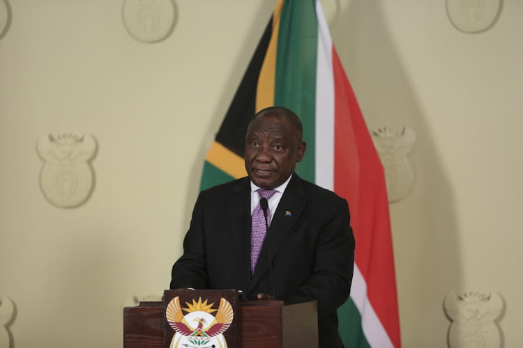 President Cyril Ramaphosa talks to journalists during a press conference on changes to his cabinet, 22 November 2018, at the Union Buildings in Pretoria