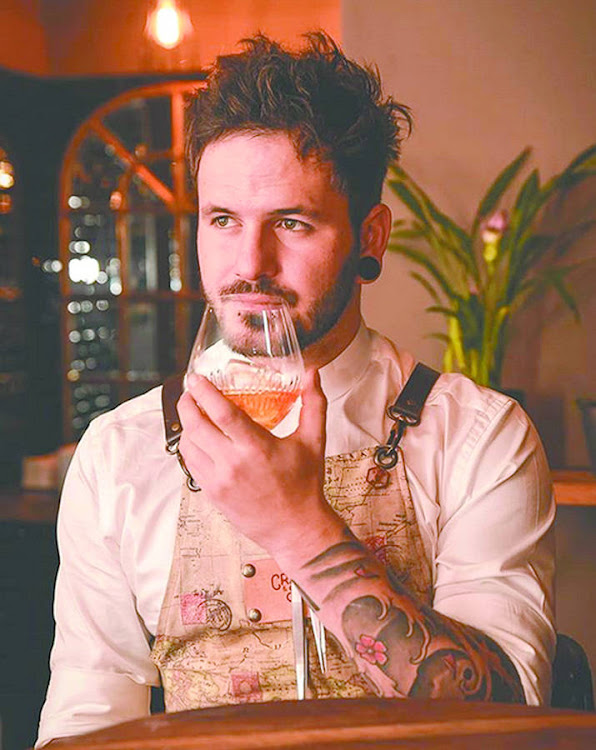 Mixologist and co-owner of Sin + Tax Julian Short.