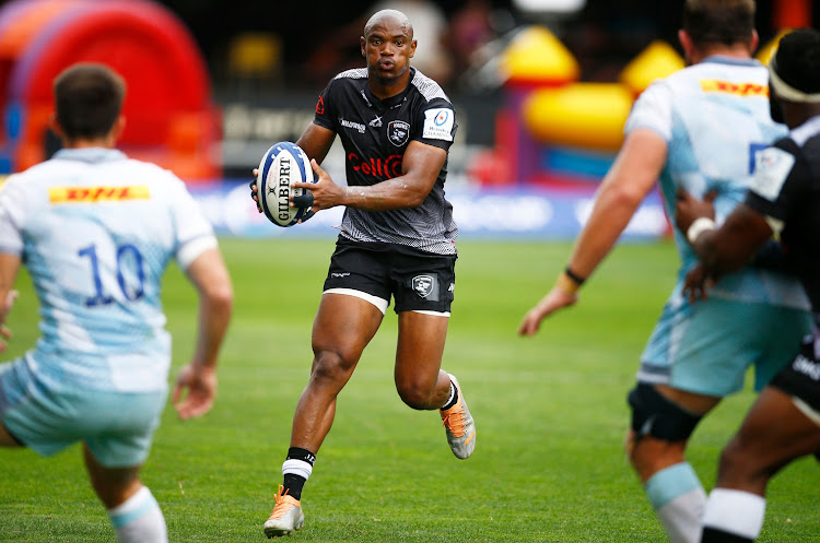 Sharks winger Makazole Mapimpi looks for an opening during their Heineken Champions Cup match against Harlequins at Hollywood Kings Park, Durban, South Africa - 10 Dec 2022.