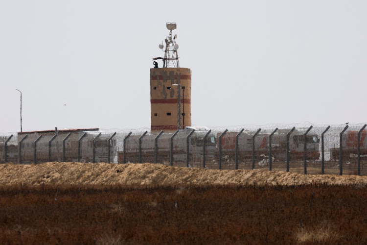 Cargo trucks park in Egypt, near the Egyptian-Israeli border. File photo: AMIR COHEN/REUTERS