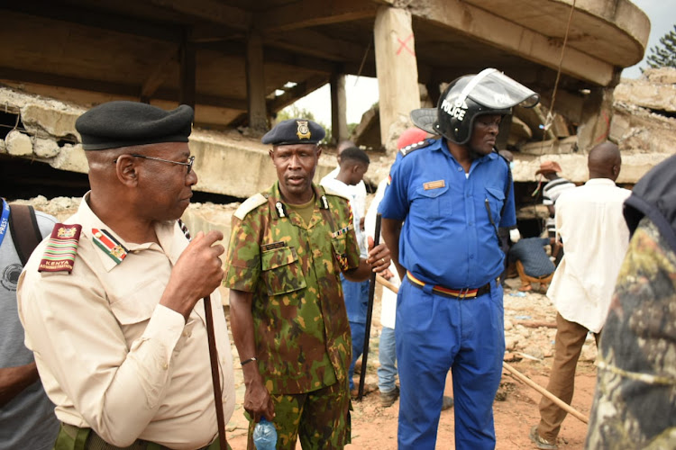 Western regional commissioner Irungu Macharia, Bungoma county police commander Francis Kooli and Bungoma South OCS David Odongo.