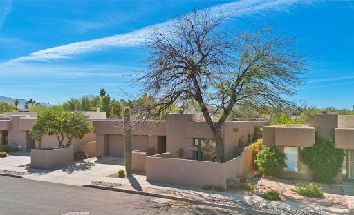 Contemporary house with cactus and tree in this luxury house for sale in Tucson ($415,000)
