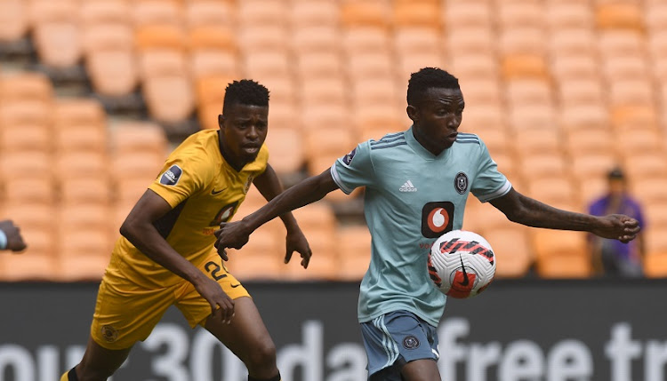 Ntsako Makhubela of Orlando Pirates challenges Phatutshedzo Nange of Kaizer Chiefs during the DStv Premiership match between Kaizer Chiefs and Orlando Pirates at FNB Stadium on November 06, 2021 in Johannesburg, South Africa.