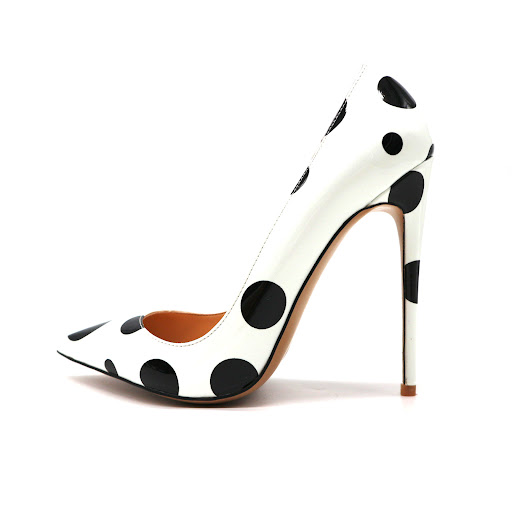 Title 4, White patent leather high heels featuring black...