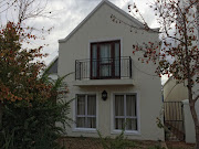 The front view of the Van Breda's family house.