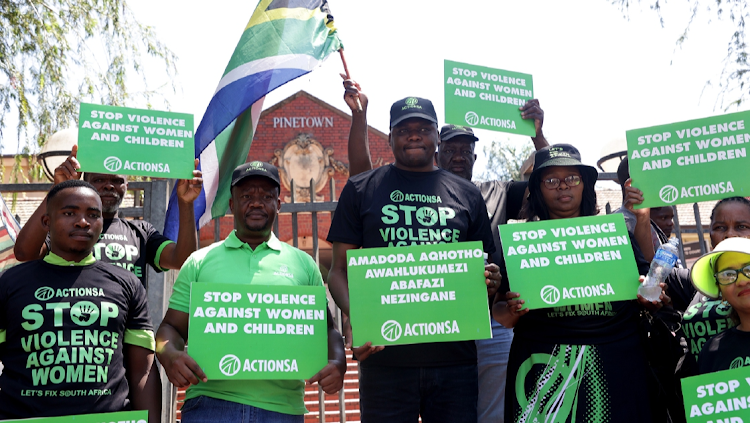 ActionSA members picket outside the Pinetown magistrate's court.