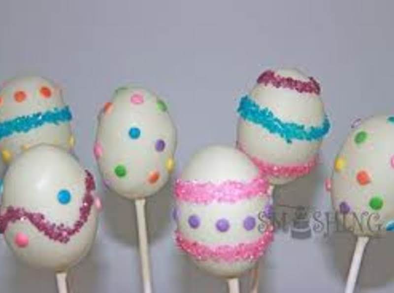 Shape Like Eggs -freeze- Dip In Melted White Or Vanilla Chocolate Decorate With Melted Chocolate And Colored Sugars. Kids Will Have A Ball.