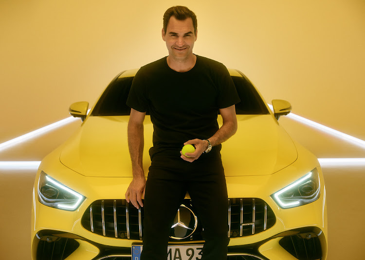 Roger Federer with the tennis-themed Mercedes.