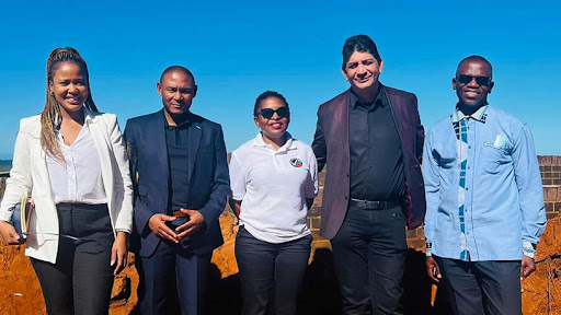 Minister Khumbudzo Ntshavheni (middle) is flanked by the CEOs and senior executives of MTN SA, Vodacom and Sentech. (Image source: Twitter)