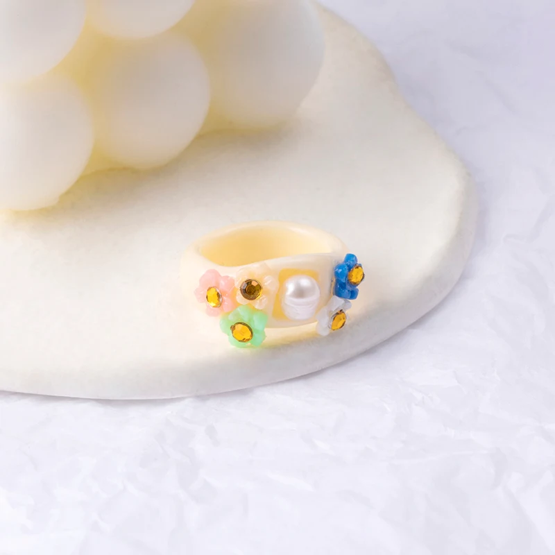 Cute Crystal Flower Acrylic Resin Ring Aesthetic Jewelry. A charming and unique accessory to add a touch of elegance and