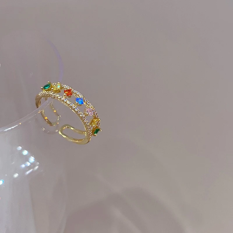 Small And Luxurious Colored Gemstone Ring. Elegant jewelry piece featuring colorful gemstones for a touch of sophisticat