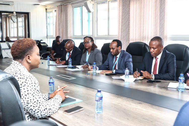 Health CS Susan Nakhumicha meets the new National Health Insurance Fund CEO Elijah Wachira and the six directors on October 27, 2023