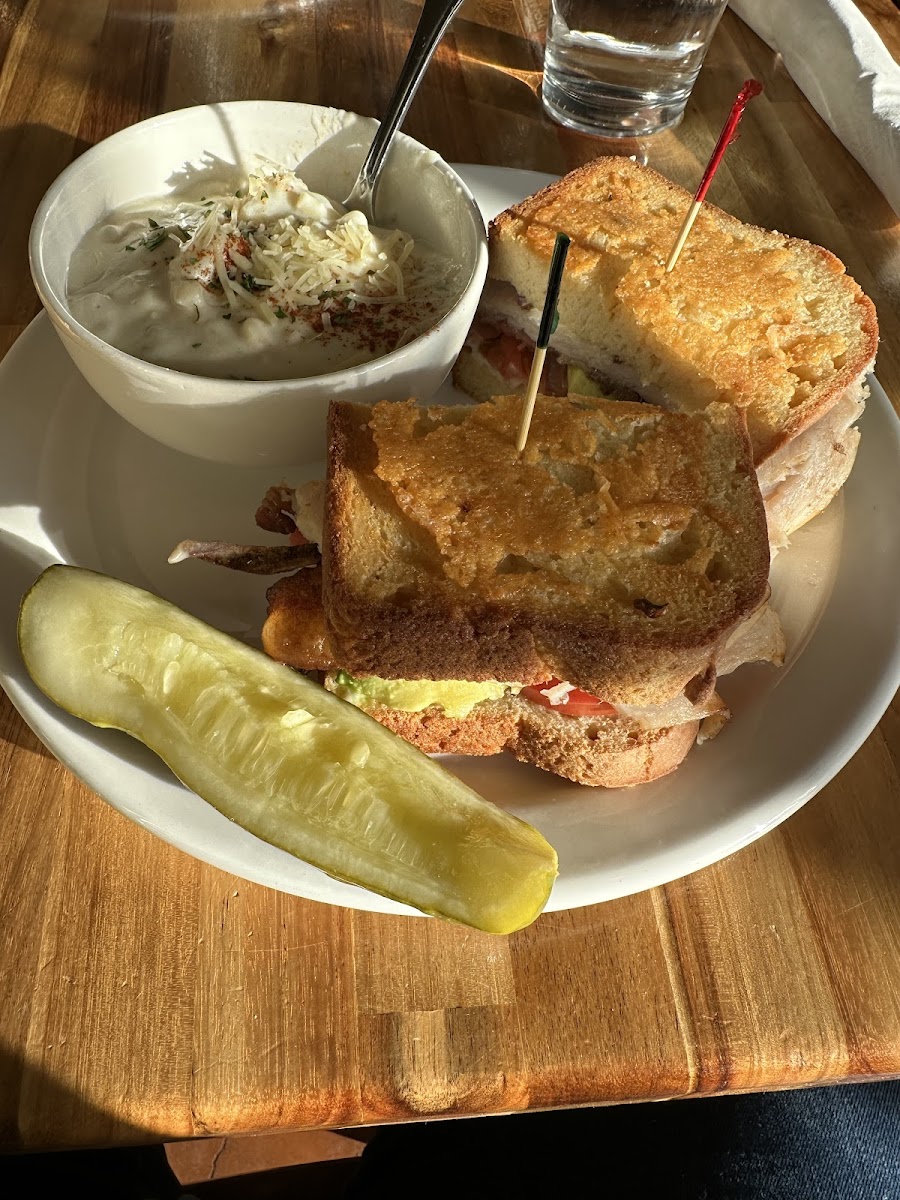 Turkey bacon and alvacado eith parmasean crusted gluten free bread.