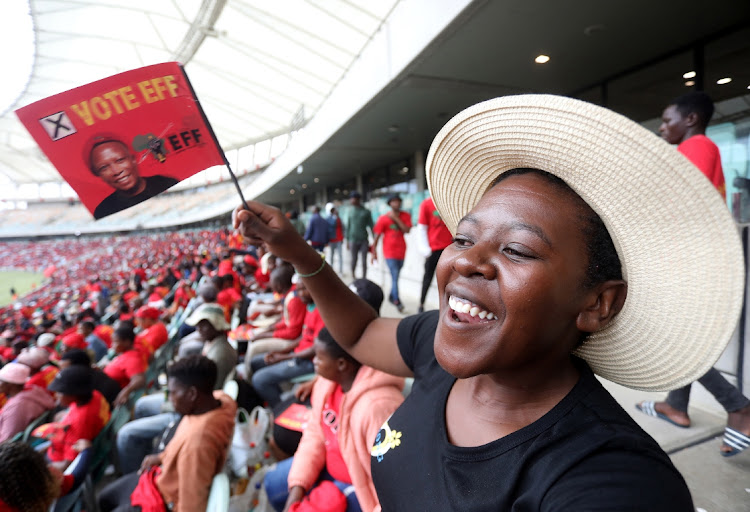 An EFF supporter smiles during the party's manifesto launch at Moses Mabhida Stadium in Durban on Saturday February 10 ahead of the general elections this year.