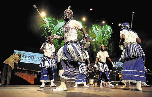 TRADITIONAL ENTERTAINMENT: Thul'uzubone cultural group from Ngqeleni perform on stage during the Eastern Cape Arts and Culture awards ceremony at The Guild at the weekend at which 44 artists were recognised for their contribution to arts and culture in the province Picture: MARK ANDREWS