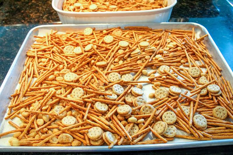 Pretzels, Peanuts, And Peanut Butter Ritz On A Greased Cookie Sheet.