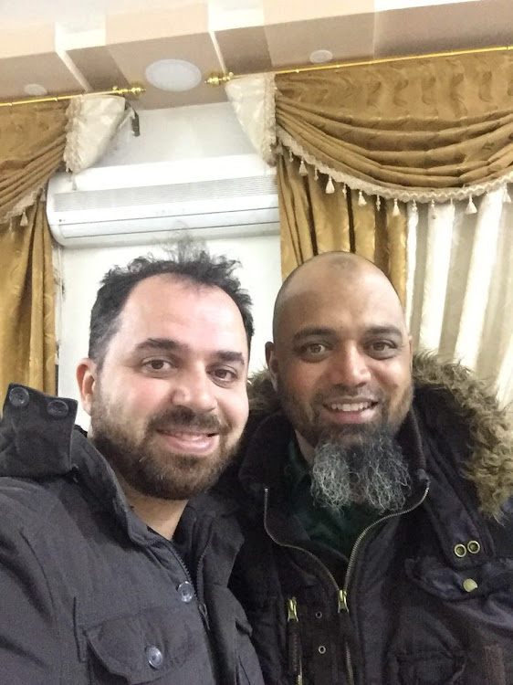 Dr Ahmad Ghandour with SA photographer Shiraaz Mohamed at Arrahma Hospital in Darkush in northern Syria. This picture was taken two days before Shiraaz was captured.