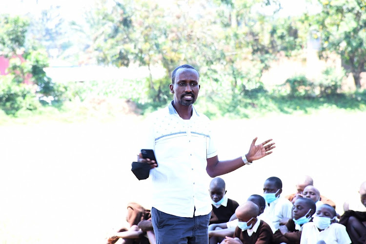 Customs regional manager for Western Aden Ibrahim at Malaba Township primary school on October 13, 2021.