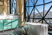 One of 28 suites in the Silo Hotel with a bathroom view over Table Mountain and Table Bay harbour. 