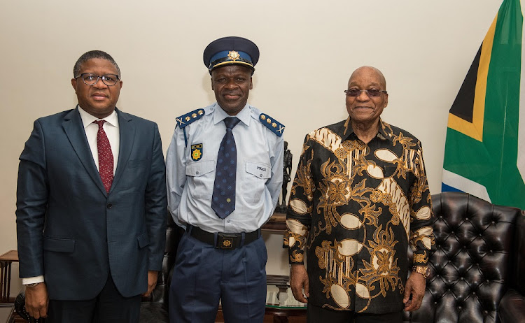 Minister of Police Mr Fikile Mbalula with the newly appointed National Police Commissioner General Khehla John Sitole and President Jacob Zuma.