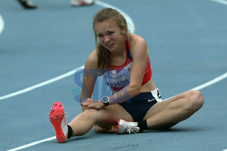 Lucie Zavadilova from Chez Republic nurse a muscle pull during the World Athletics U20 championships being held at the Moi International Stadium Kasarani on August 18, 2021.