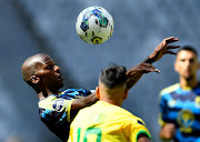 Thamsanqa Mkhize of Cape Town City chests under the attention of Mamelodi Sundowns' Gaston Sirino in the DStv Premiership match at Cape Town Stadium on Sunday.