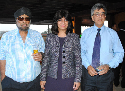 H.S Justey Insurance chairman Harjindert Justley, Mayfair executive director Shehnaz Sumar and Crownscope Insurance brokers CEO Bharat Lakhani during the Mayfair appreciation cocktail at National Museums of Kenya.