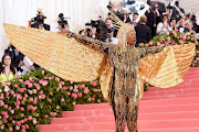 Actor Billy Porter wearing a custom outfit at the 2019 Met Gala.