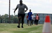  Wannabe crime prevention officers exercise during a fitness test at Modderbee Correctional Services, Benoni. 