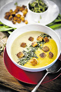 Two-tone butternut and sweet potato soup with paprika croutons.