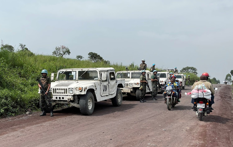 Peacekeepers serving in the United Nations Organization Stabilization Mission in the Democratic Republic of the Congo (MONUSCO) secure the scene where the Italian ambassador to Democratic Republic of Congo Luca Attanasio, Italian military policeman Vittorio Iacovacci and Congolese driver Moustapha Milambo from the World Food Programme were killed in an attempted kidnap when their convoy was attacked in Ruhimba village, eastern Democratic Republic of the Congo on February 22, 2021.