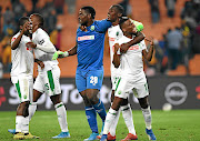 AmaZulu players celebrate with their keeper Siyabonga Mbatha after he kept a clean sheet against Chiefs.