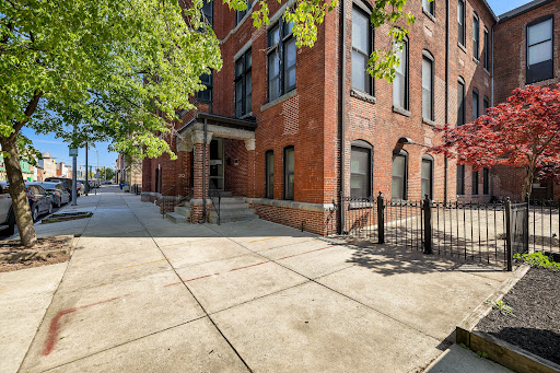 Brick building with paved sidewalk in this luxury apartment / penthouse for sale in Baltimore ($150,000)