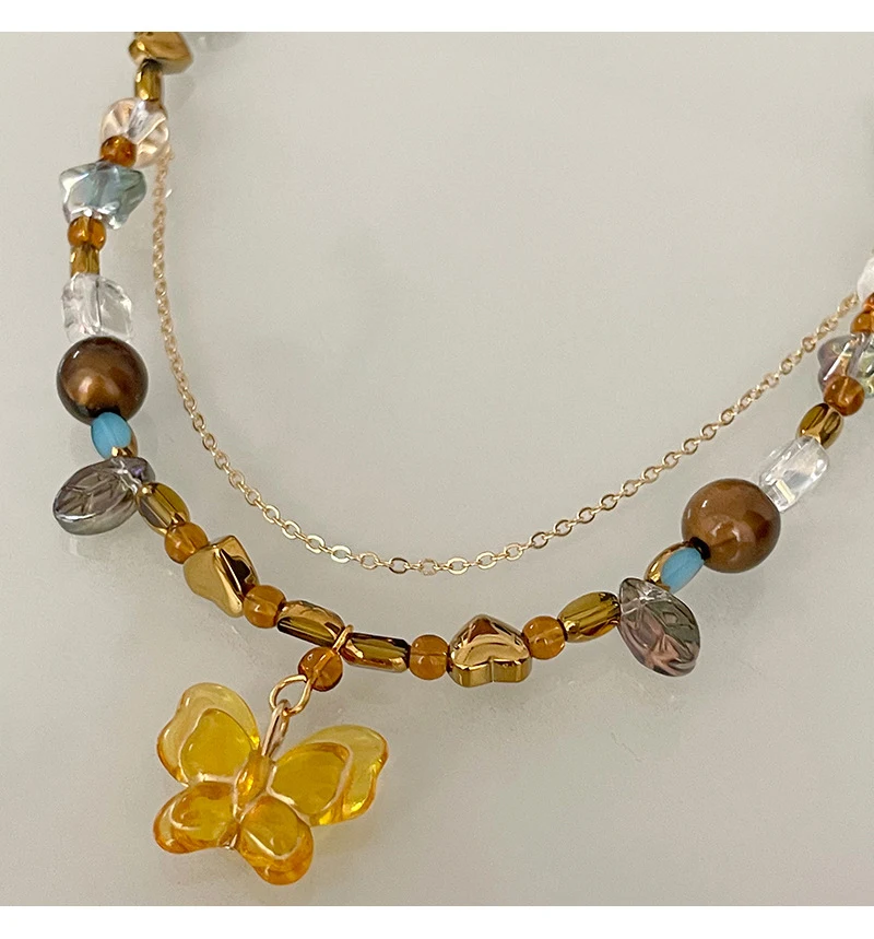 Title 4, Collier papillon brodé de perles colorées. Acce...