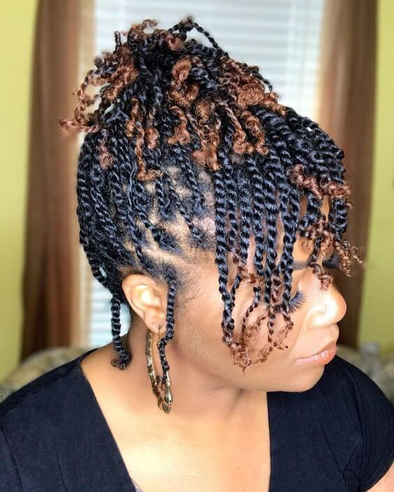 lady wearing black and brown twists