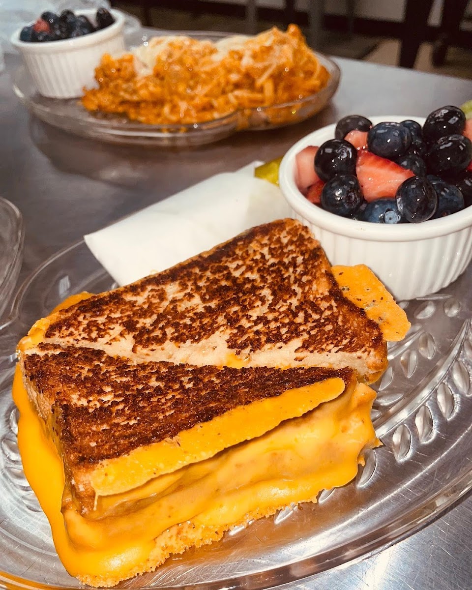 Gooey Grilled Cheese on homemade Gluten Free bread with a side of Fruit Salad.  (Spaghetti Bake in the background.)