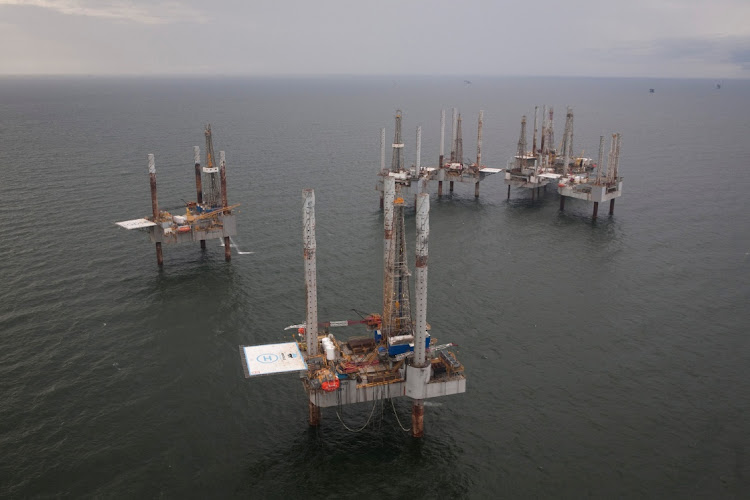 Unused oil rigs sit in the Gulf of Mexico near Port Fourchon, Louisiana.