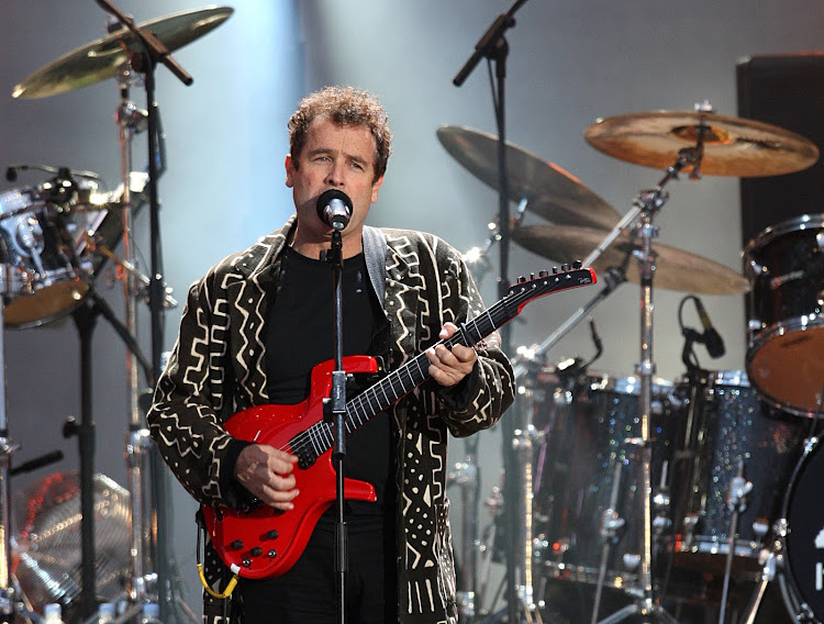 Johnny Clegg performs during the 46664 concert honouring Nelson Mandela's 90th birthday in Hyde Park, London.