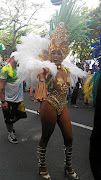 A woman in Brazilian carnival attire.