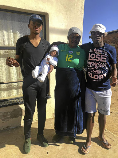 SuperSport United midfielder Sipho Mbule, left, with his mom Mmatumane Mbule and friend Thuso Mhlakoana at home in Bethlehem, Free State. /Supplied