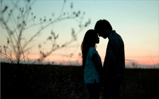 Teenagers kissing. File photo